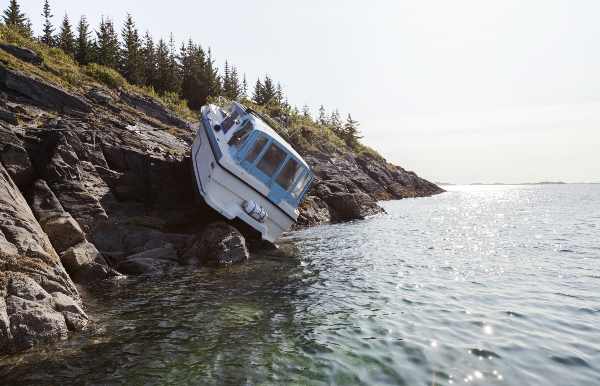 a boat sit on a rocky surface after an accident in florida